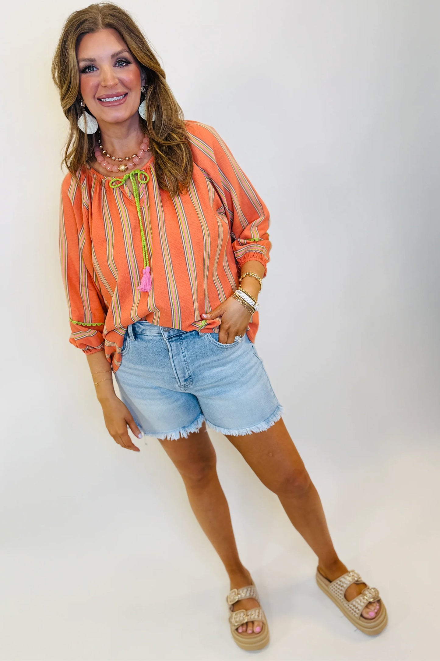 Orange Stripe Tassel Tie Neck Blouse