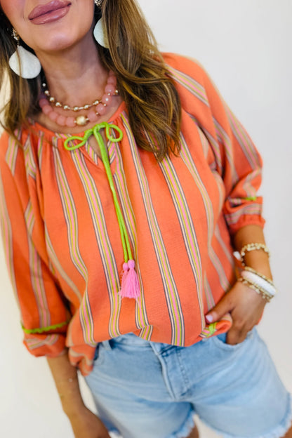 Orange Stripe Tassel Tie Neck Blouse